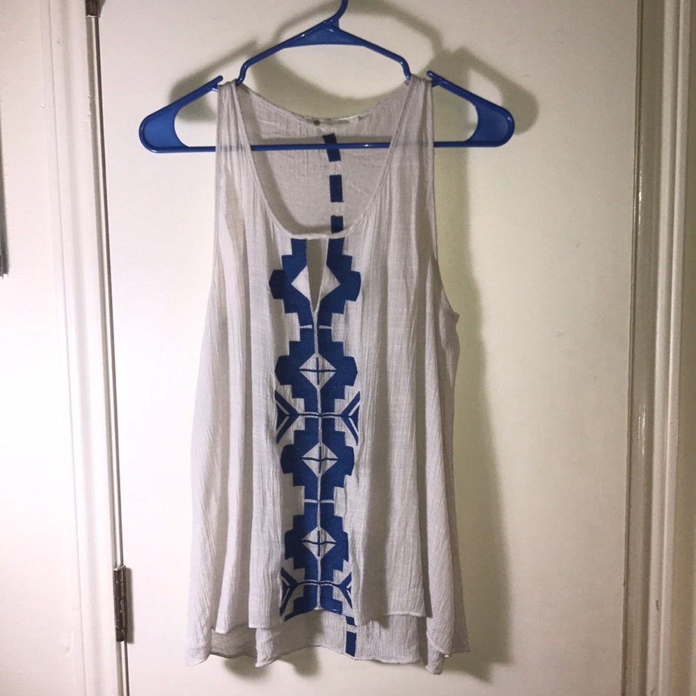 white blouse with blue accents